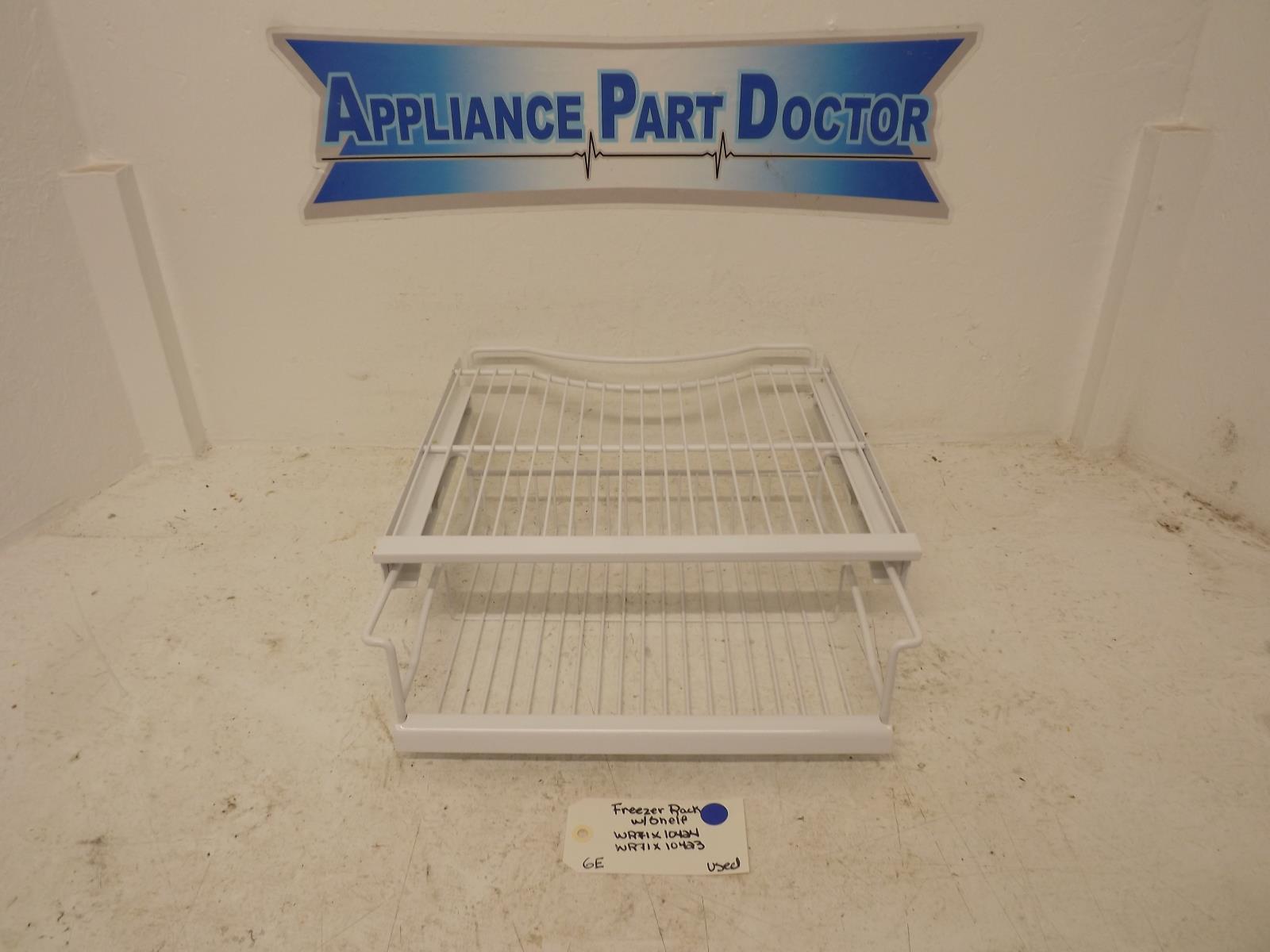 GE Refrigerator WR71X10423 Freezer Rack w/Shelf Used GE Refrigerator WR71X10423 Freezer Rack w/Shelf Used